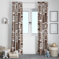 Set of brown patchwork window curtains with holiday prints and stitched-looking block design