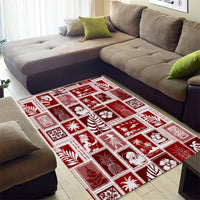 Red patchwork area rug with white holiday tile patterns and decorative grid squares
