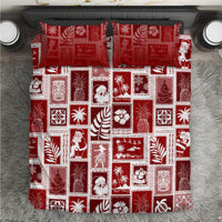 Red patchwork bedding set with square holiday prints and festive character motifs