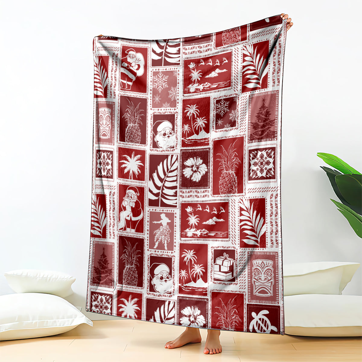 Red patchwork-style Christmas blanket with novelty scene and leaf motifs, rectangular throw