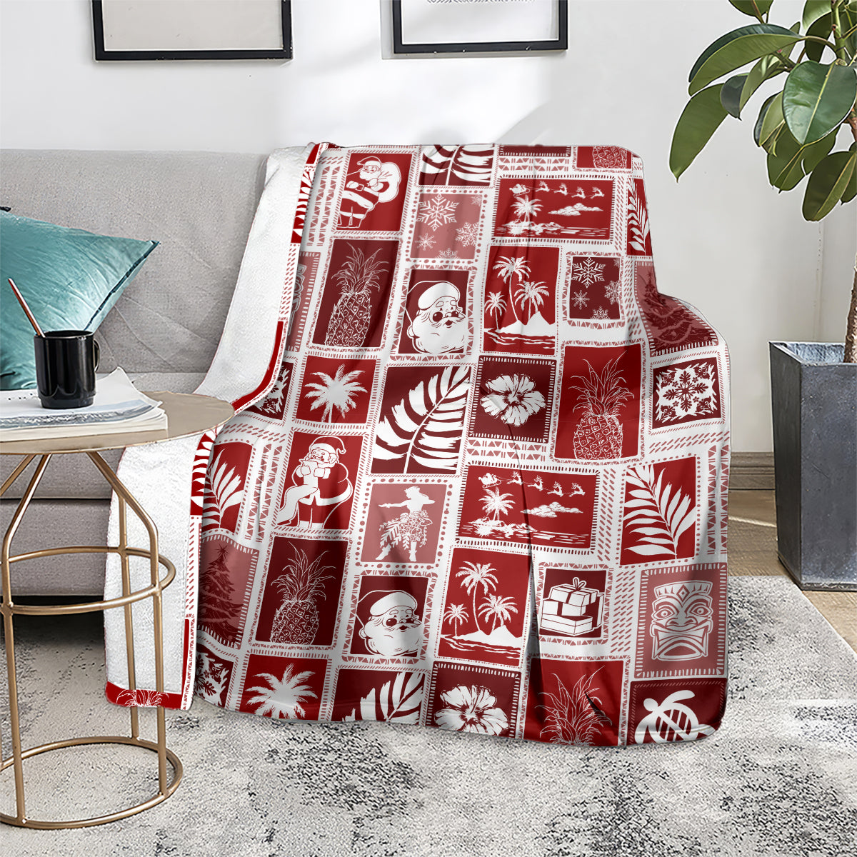 Red patchwork Christmas blanket folded on sofa, grid of festive icons and palm motifs