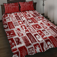 Red patchwork quilt and two pillows with white grid squares and tropical Christmas icons