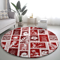 Red round Christmas patchwork carpet with white square borders and tropical motif blocks