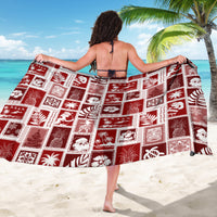 Red patchwork sarong with white square pattern, skirt-style drape from behind