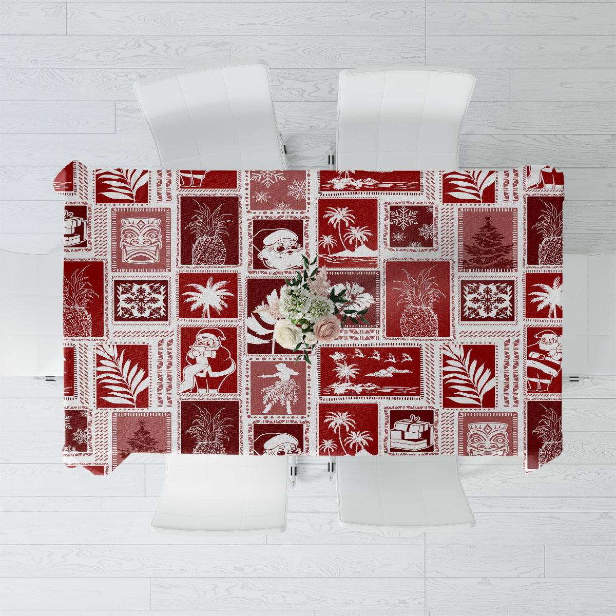 Red patchwork tablecloth with white holiday icons and square patterned blocks