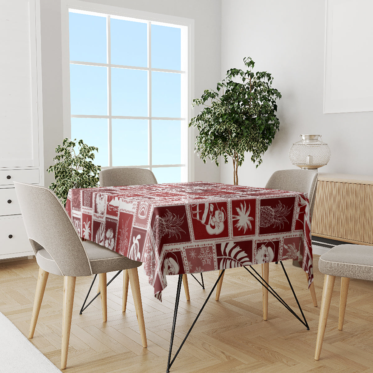 Red patchwork holiday tablecloth with white motif squares on dining table