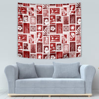 Red patchwork tapestry with white patchwork icons, rectangular wall hanging