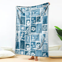 Aquamarine patchwork blanket with blue-and-white holiday and tropical square motifs