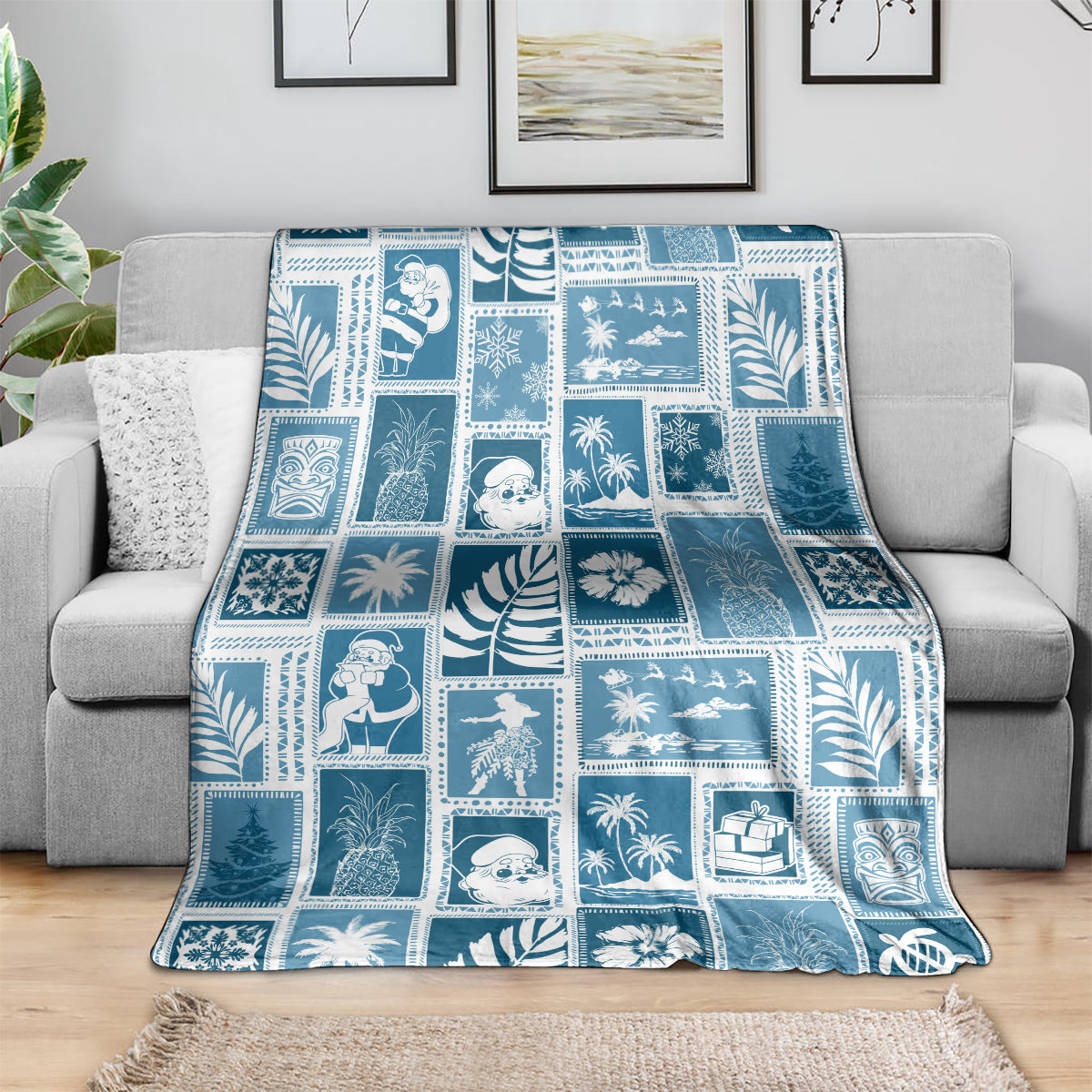 Blue-and-white patchwork throw blanket in aquamarine tones with holiday and tropical squares