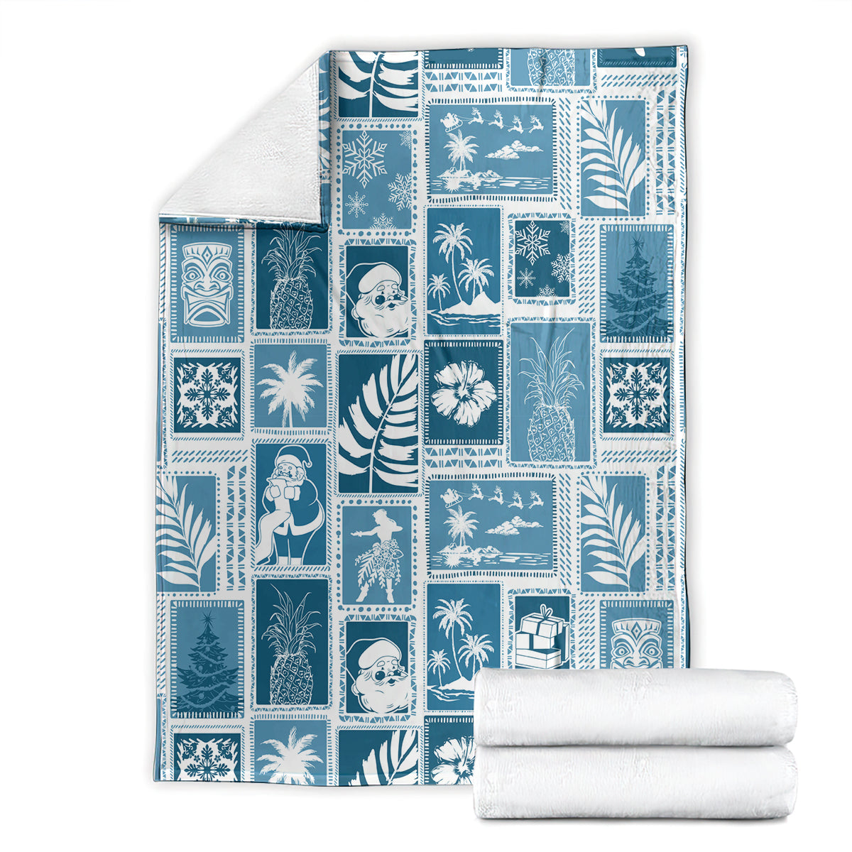 Aquamarine patchwork blanket laid flat with blue-and-white holiday and tropical block designs