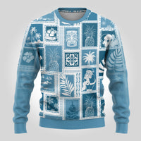 Aquamarine crewneck sweater with patchwork panel print of tropical plants and figures