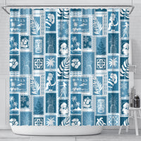 Aquamarine patchwork shower curtain with blue-white tropical and holiday motifs, hanging on rod
