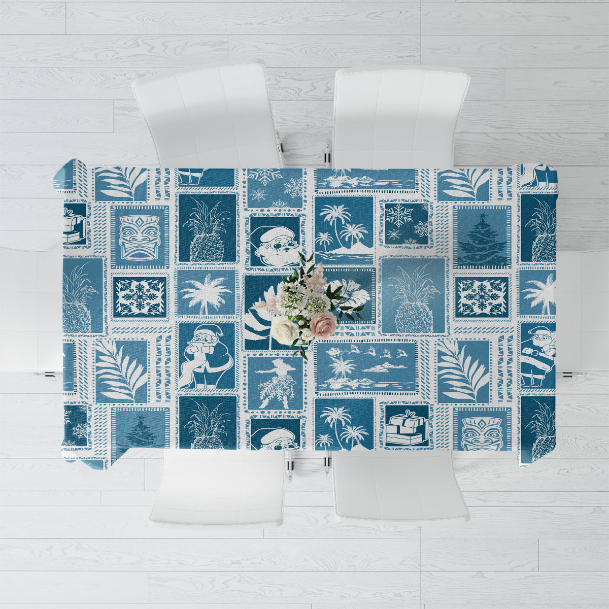 Aquamarine patchwork tablecloth with tropical and Christmas-themed blue patterns