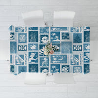 Aquamarine patchwork tablecloth with tropical and Christmas-themed blue patterns