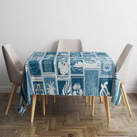 Aquamarine blue patchwork tablecloth with square blocks and tropical leaf designs