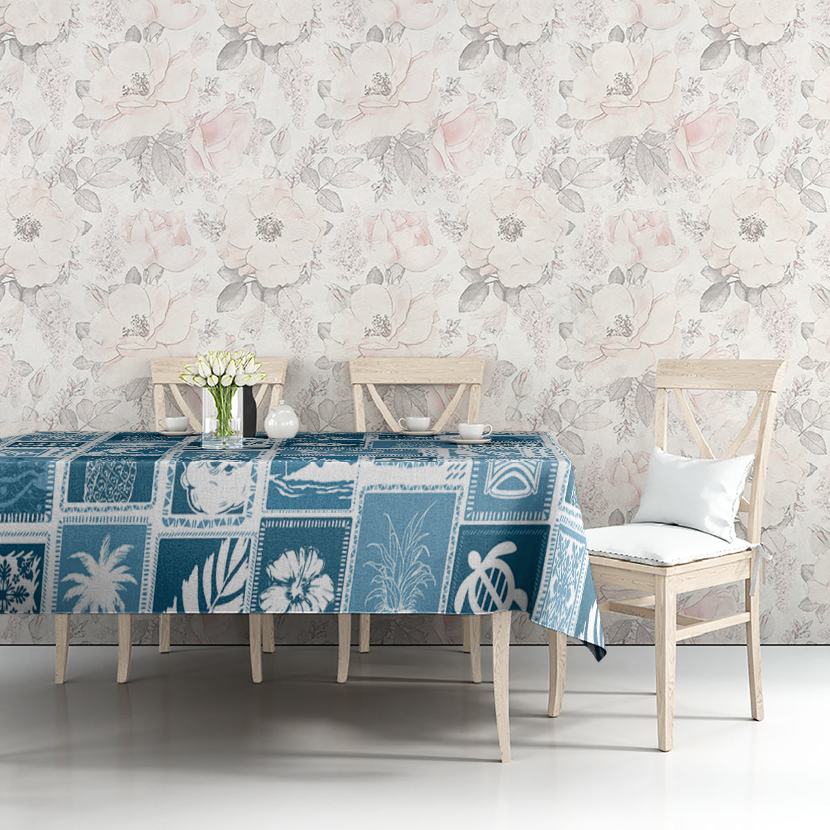 Aquamarine blue patchwork tablecloth with repeating tropical square blocks and icons
