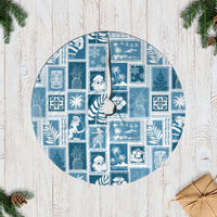 Aquamarine patchwork Christmas tree skirt with circular design and woven pattern.