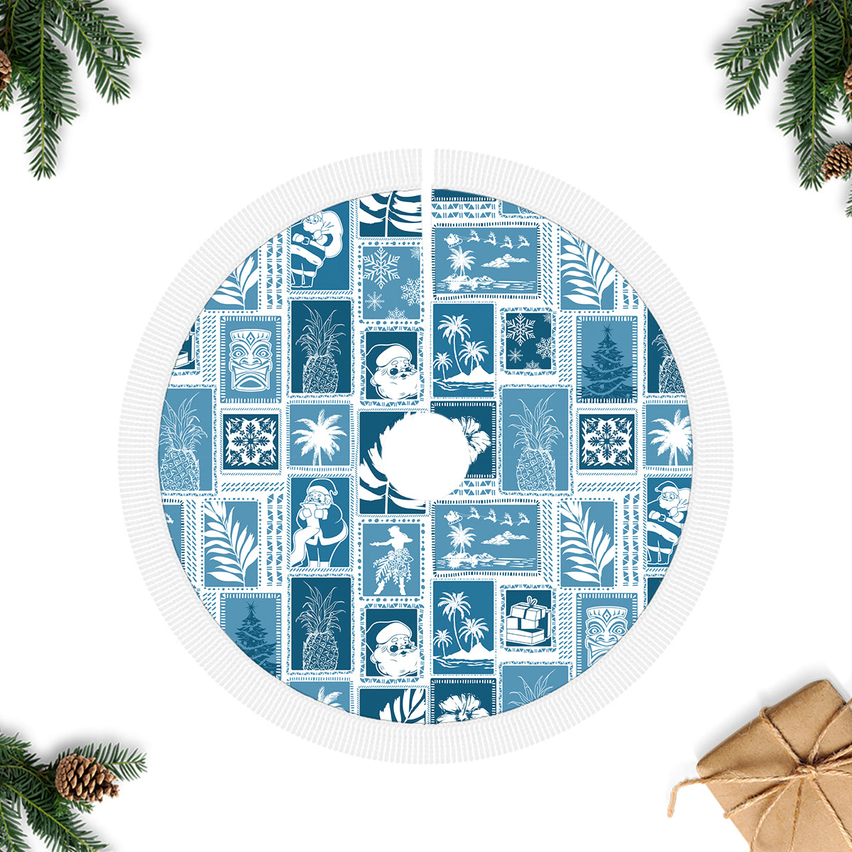 Aquamarine patchwork Christmas tree skirt with white fringe edge and winter blocks.