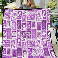Violet Hawaiian patchwork quilt with white decorative island-style print blocks