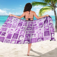 Purple sarong with white patchwork tropical icons, shown from behind