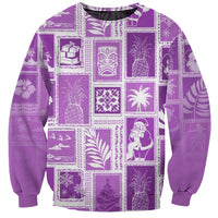 Violet crewneck pullover sweatshirt with white patchwork holiday graphics, long sleeves