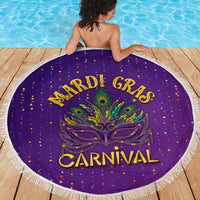 Purple round beach blanket with fringe, Mardi Gras Carnival mask motif.