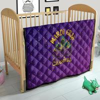 Purple Mardi Gras quilt on crib with diamond stitching, confetti dots, fleur-de-lis “Carnival” text