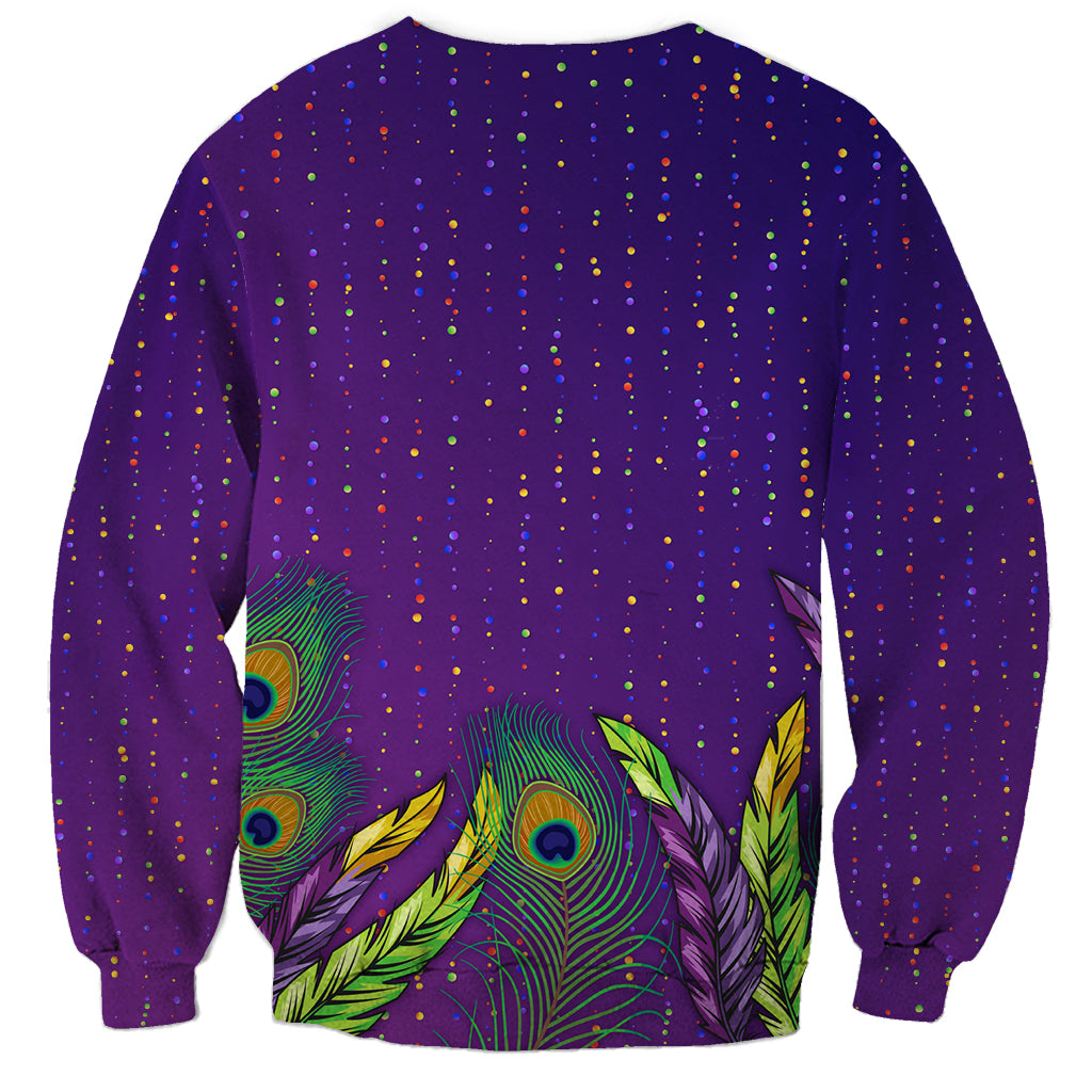 Purple unisex sweatshirt with colorful peacock feather print on back and confetti dots