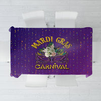 Purple Mardi Gras tablecloth with confetti dots and Mardi Gras Carnival logo.