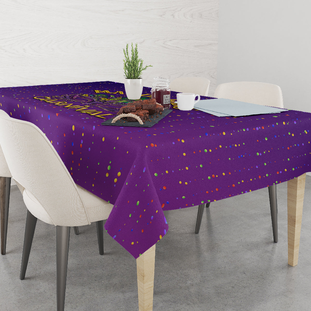 Purple confetti tablecloth covering a dining table with a hanging corner edge.