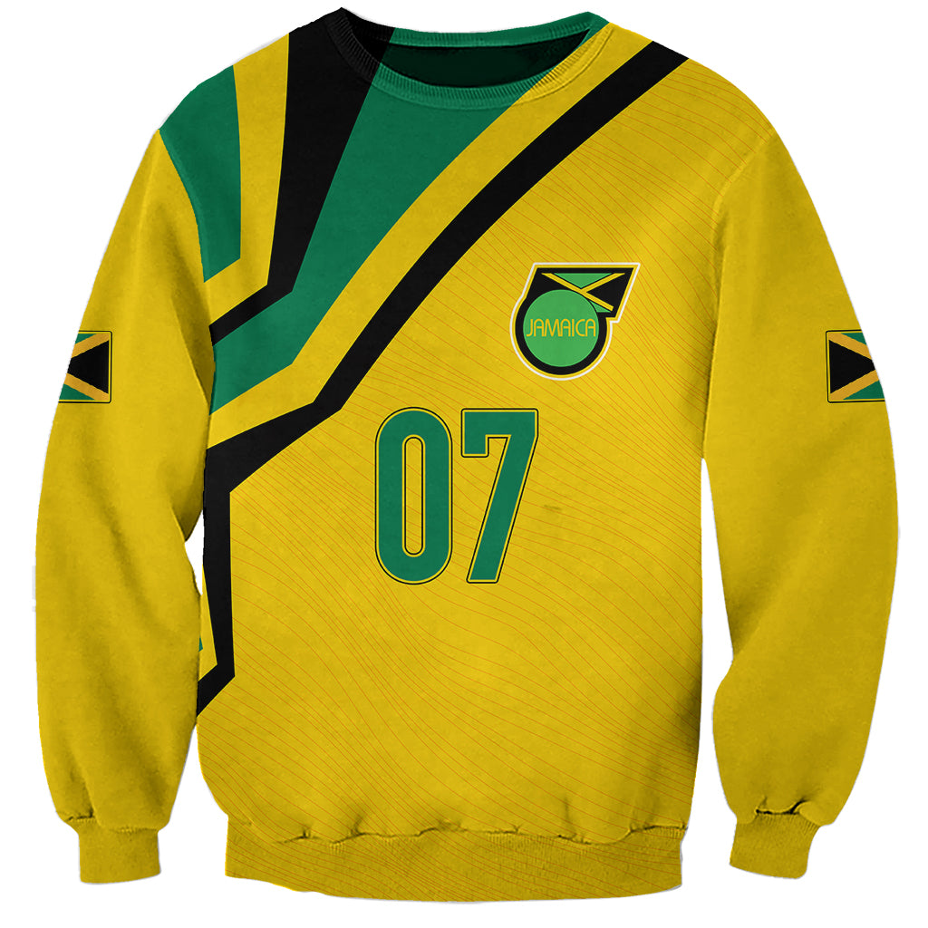 Yellow sweatshirt with green/black diagonal stripes, Jamaica crest and number 07