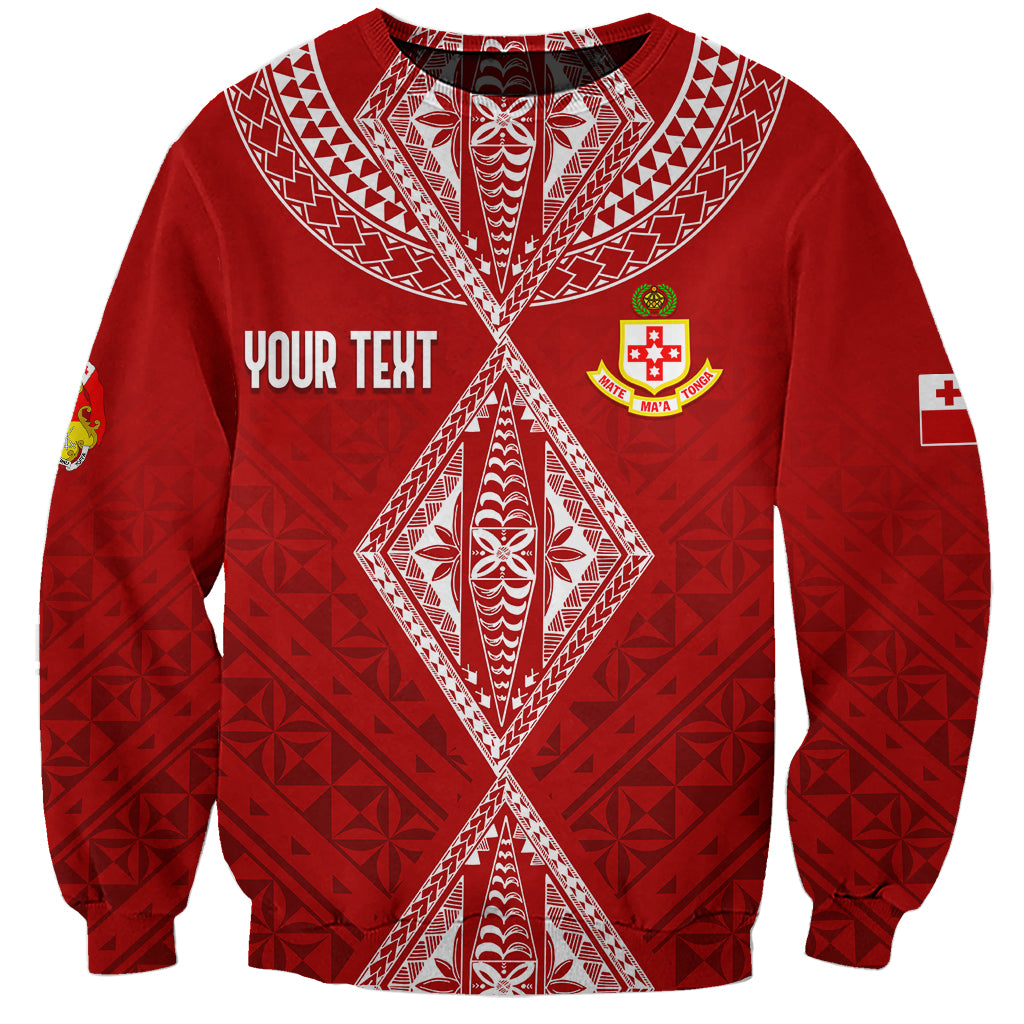 Red crewneck sweatshirt with white Tongan pattern, crest, and 'YOUR TEXT' print
