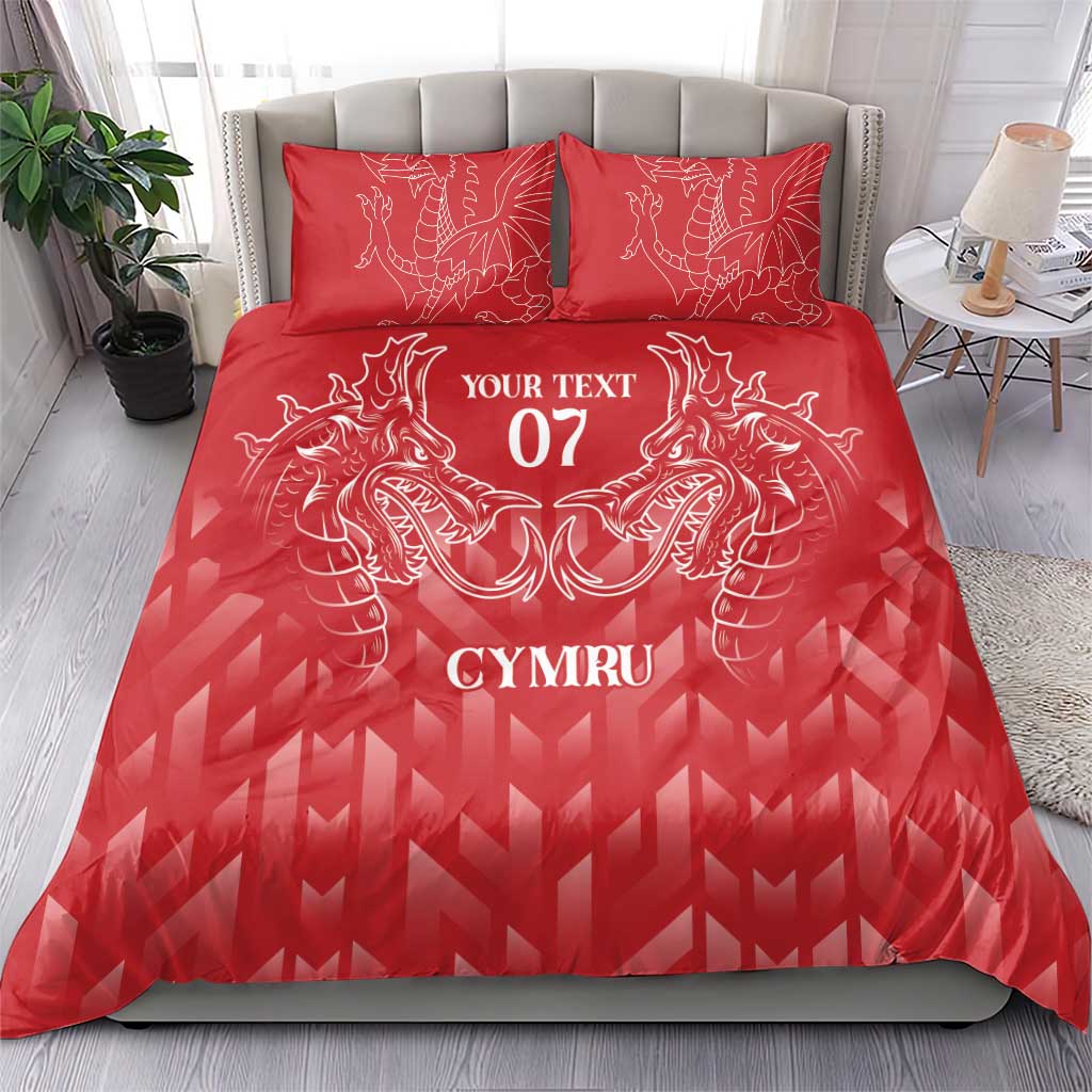 Red duvet cover set with dragon emblem, “YOUR TEXT 07” and “CYMRU” on bed