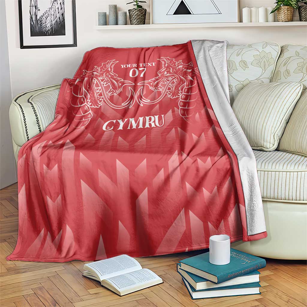 Red personalized rugby blanket with dragon crest, 'YOUR TEXT 07' and 'CYMRU'