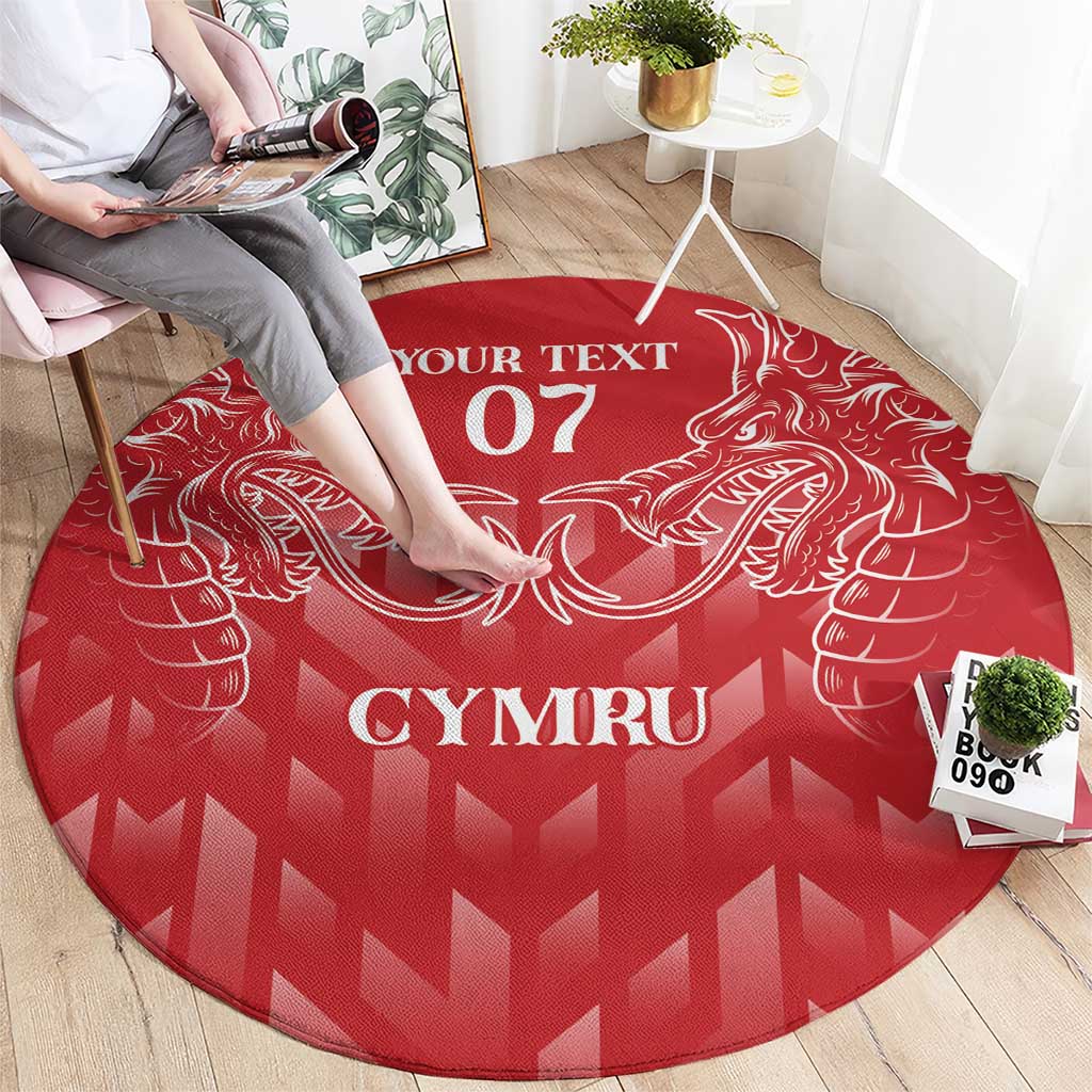 Red round rug featuring a white dragon crest with 'YOUR TEXT 07' and 'CYMRU' text