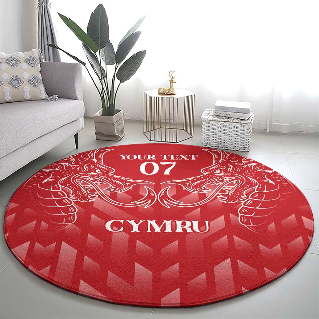 Red round rug with white heraldic dragon graphics, 'YOUR TEXT 07', and 'CYMRU' lettering