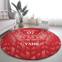 Red round rug with white heraldic dragon graphics, 'YOUR TEXT 07', and 'CYMRU' lettering