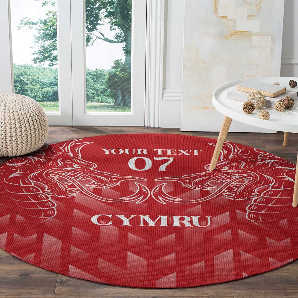 Red round rug with white dragon crest, 'YOUR TEXT 07' header, and 'CYMRU' center text