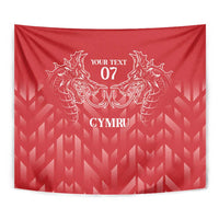 Red tapestry close-up with white twin dragons, “YOUR TEXT” 07, and CYMRU.
