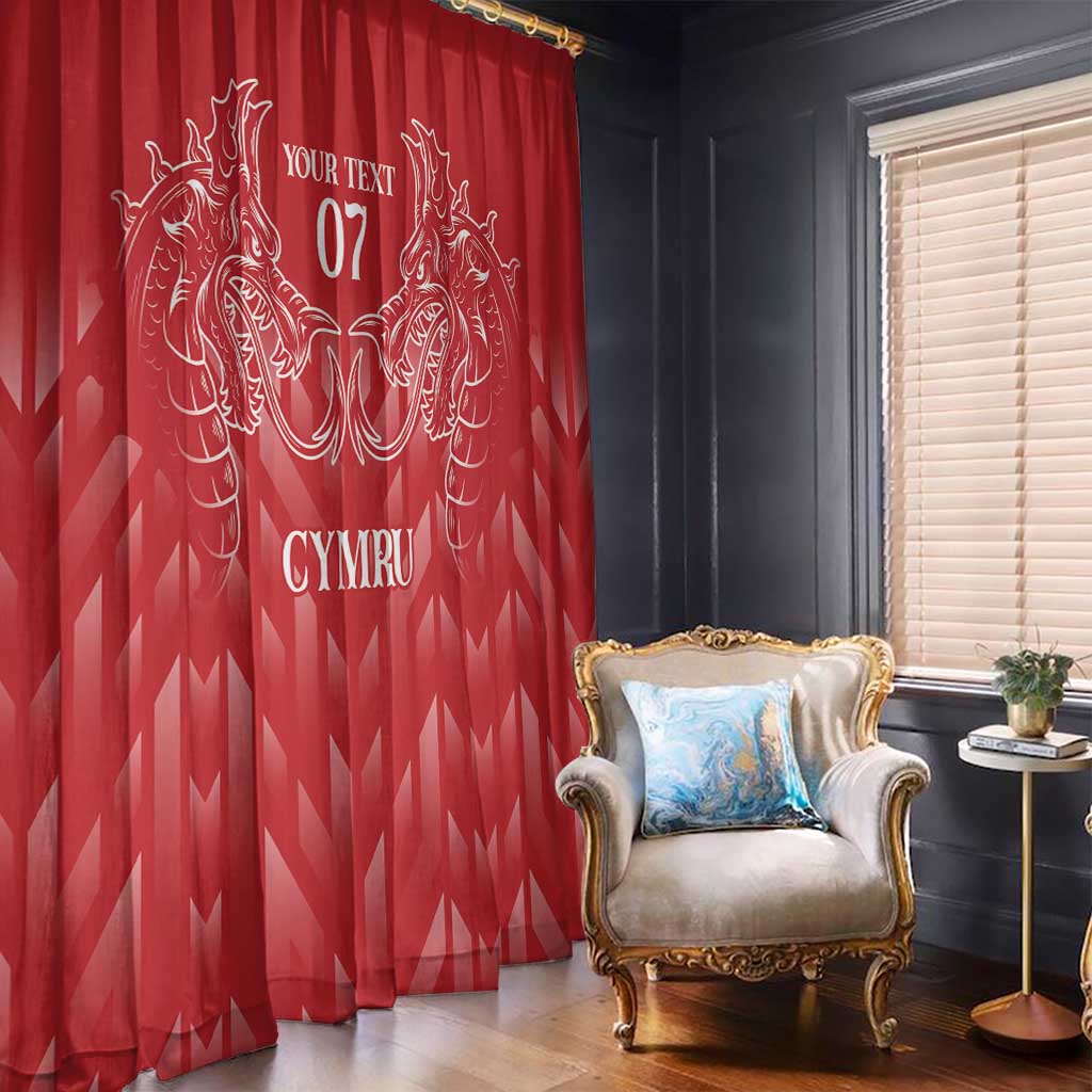 Red window curtain pair with white dragon crest and centered personalized text, hanging indoors.