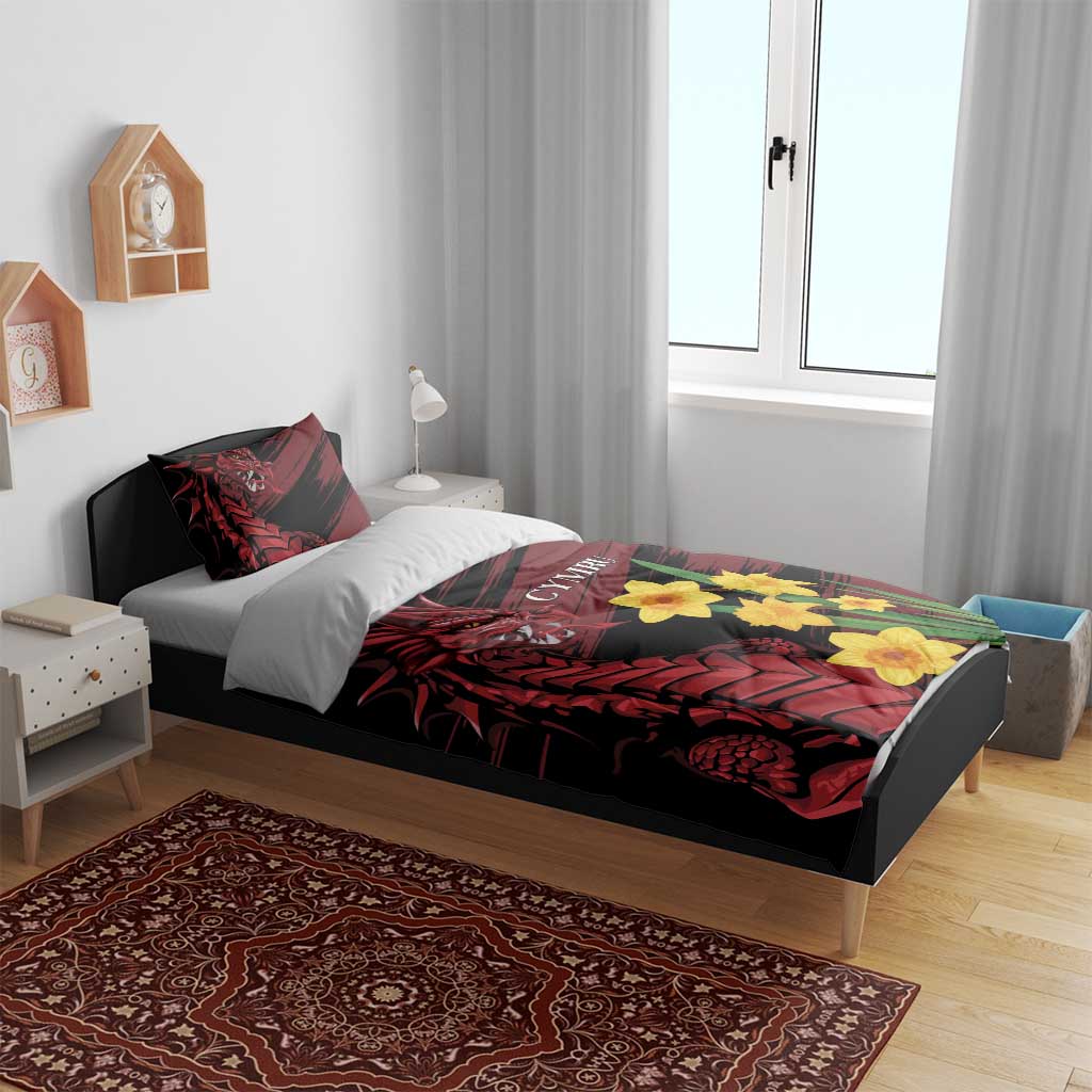 Black bedding set with red dragon print, yellow daffodils, and 'CYMRU' lettering on duvet.
