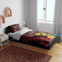 Black bedding set with red dragon print, yellow daffodils, and 'CYMRU' lettering on duvet.