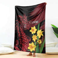 Dragon and daffodil blanket draped, black with red Welsh dragon, yellow daffodils and Cymru