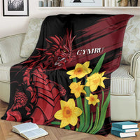 Dragon and daffodil blanket on armchair, black with red dragon and yellow daffodils, Cymru
