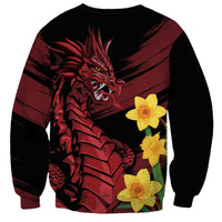 Black sweatshirt with dragon graphic and yellow daffodils on maroon panel, long sleeves
