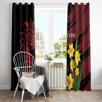 Hanging curtain panels with black left panel and burgundy right panel, yellow daffodils