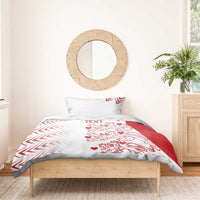 White and red duvet cover with matching pillow shams and lion hearts print