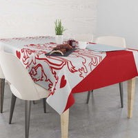 Red and white graphic tablecloth with diagonal panel and crest-like motifs