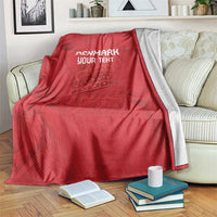 Red football blanket over sofa with white DENMARK YOUR TEXT and central coat-of-arms pattern