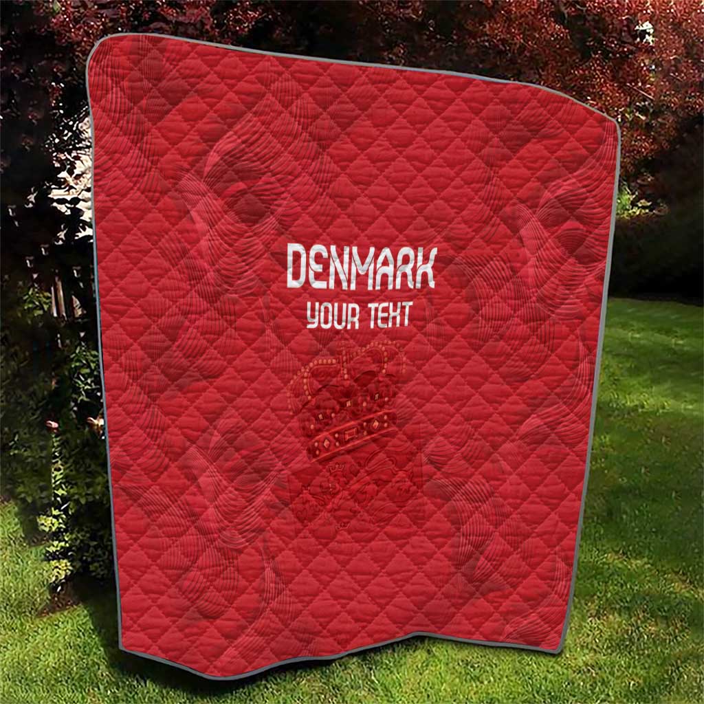 Red quilt with diamond stitching, black outline border, 'DENMARK' and 'YOUR TEXT' logo